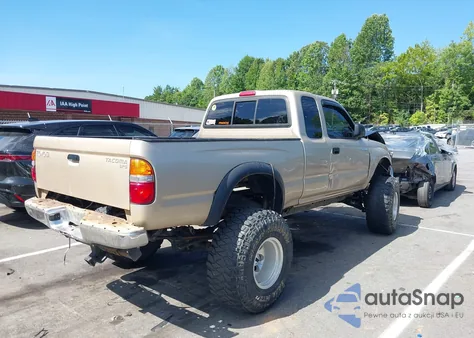 2001 Toyota Tacoma из США, поврежденный, VIN 5TEWM72N71Z780225